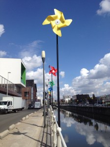 The canal near the Metro - pretty pinwheels on both sides broke up an otherwise dull cityscape